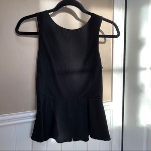 Black peplum top, with back cutouts